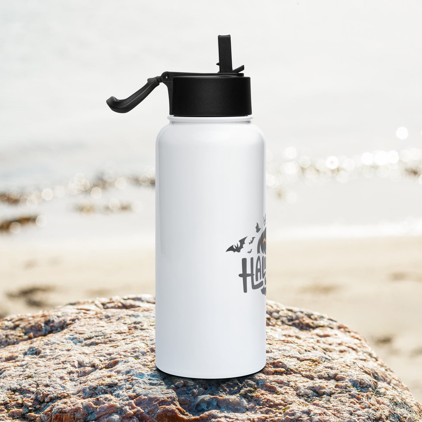 Stainless steel water bottle with a straw lid
